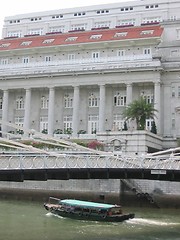 Image showing Cavenagh Bridge Next To Fullerton Hotel In Singapore