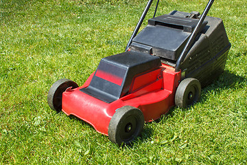 Image showing Lawnmower on grass