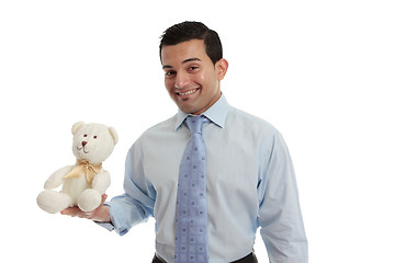 Image showing Man holding a knitted teddy bear