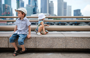 Image showing Two kids at city