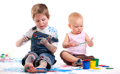 Image showing Boy and girl painting
