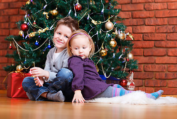 Image showing Two kids at Christmas