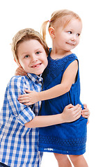 Image showing Brother and sister hugging