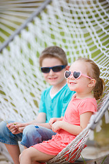 Image showing Kids sitting in hammock