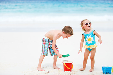 Image showing Kids playing with beach toys