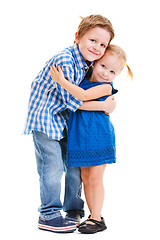 Image showing Brother and sister hugging