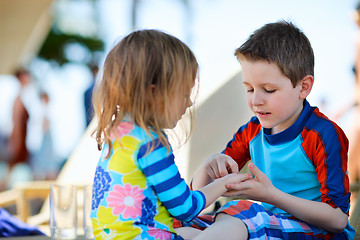 Image showing Two kids playing together 