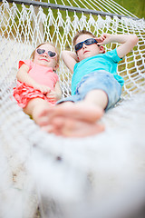 Image showing Kids relaxing in hammock