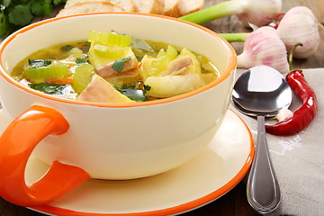 Image showing Fish soup with vegetables in a bowl.