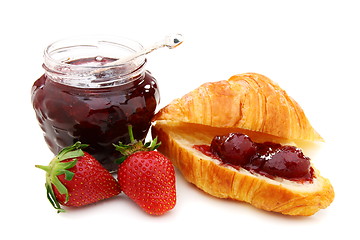 Image showing Croissant with strawberry jam and fresh berries.