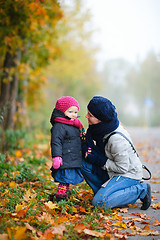 Image showing Mother And Daughter Outdoors On Foggy Day