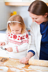 Image showing Family baking cookies