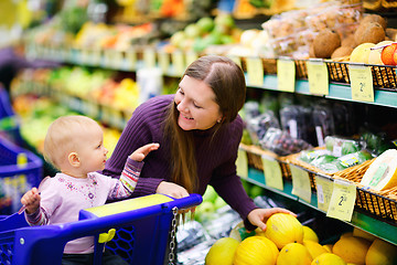 Image showing Family buying fruits in supermarket