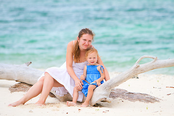Image showing Mother and her daughter on tropical beach