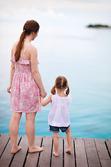 Image showing Mother and daughter enjoying sea views