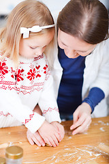 Image showing Family baking cookies