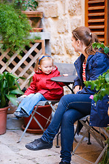 Image showing Mother and daughter portrait outdoors