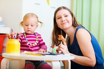 Image showing Mother and daughter playing together