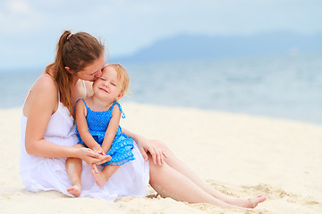 Image showing Loving mother and daughter on tropical beach