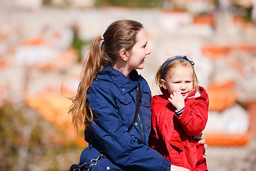 Image showing Mother and daughter portrait outdoors