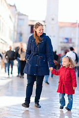 Image showing Mother and daughter in city