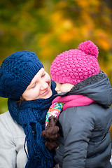 Image showing Mother and daughter at autumn park