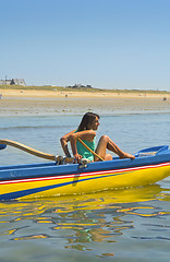 Image showing woman in pirogue