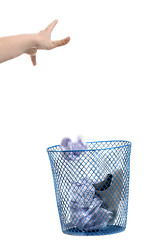 Image showing Hand throwing out paper 