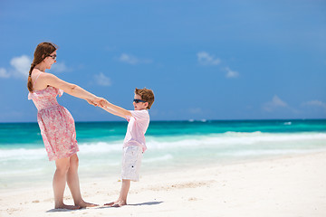 Image showing Mother and son at beach