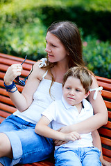 Image showing Mother and son outdoors