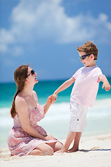 Image showing Mother and son at beach