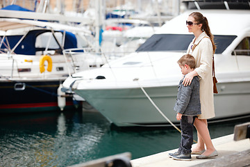 Image showing Mother and son at harbor