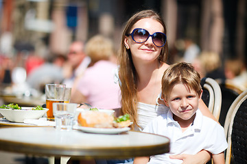 Image showing Family having lunch outdoors 