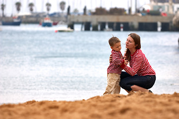 Image showing Mother and son playing together outdoors