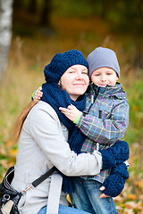 Image showing Mother and her son outdoors