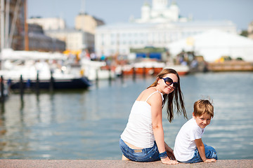 Image showing Mother and son in city center Helsinki Finland