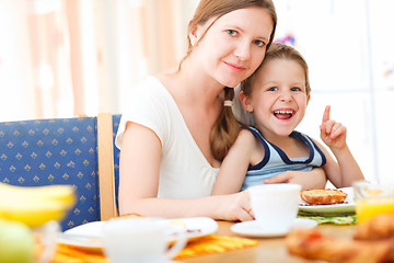 Image showing Mother and son having breakfast