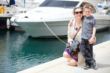 Image showing Mother and son at harbor