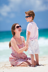 Image showing Mother and son at beach