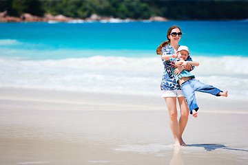 Image showing Mother and son at beach