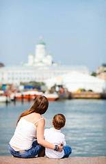 Image showing Mother and son enjoying views of city center