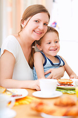 Image showing Mother and son having breakfast