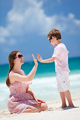 Image showing Mother and son at beach