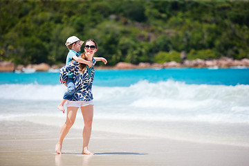 Image showing Mother and son at beach