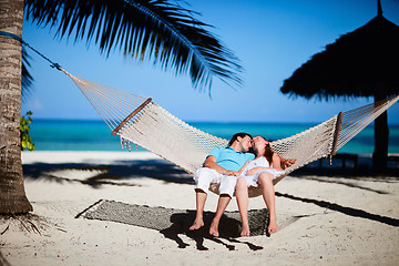 Image showing Romantic couple relaxing in hammock