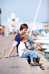 Image showing Father and son in city harbor