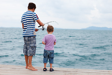 Image showing Father and son fishing