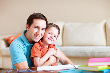 Image showing Father and son at home