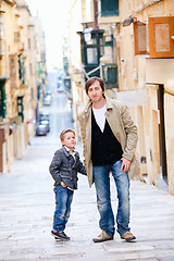 Image showing Father and son in city