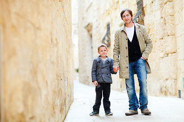 Image showing Father and son in city